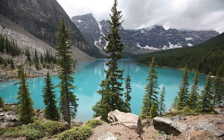 Turquoise Moraine Lake beneath the rugged peaks of Banff National Park, Canada.
