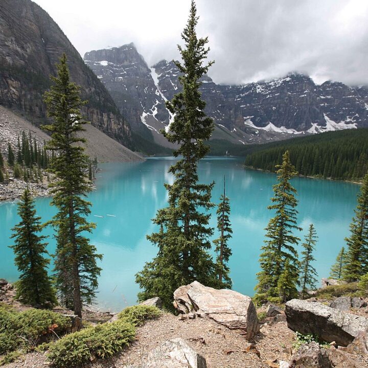 Turquoise Moraine Lake beneath the rugged peaks of Banff National Park, Canada.