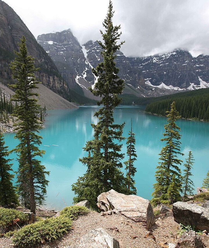Turquoise Moraine Lake beneath the rugged peaks of Banff National Park, Canada.