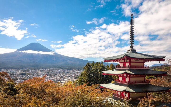 Chureito Pagoda overlooking Fujiyoshida with Mount Fuji in the distance.